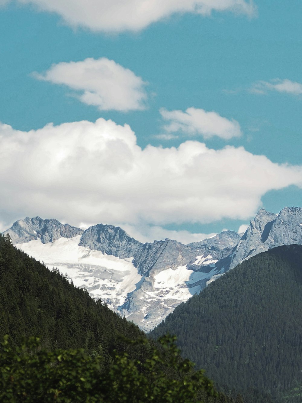 a mountain range with snow