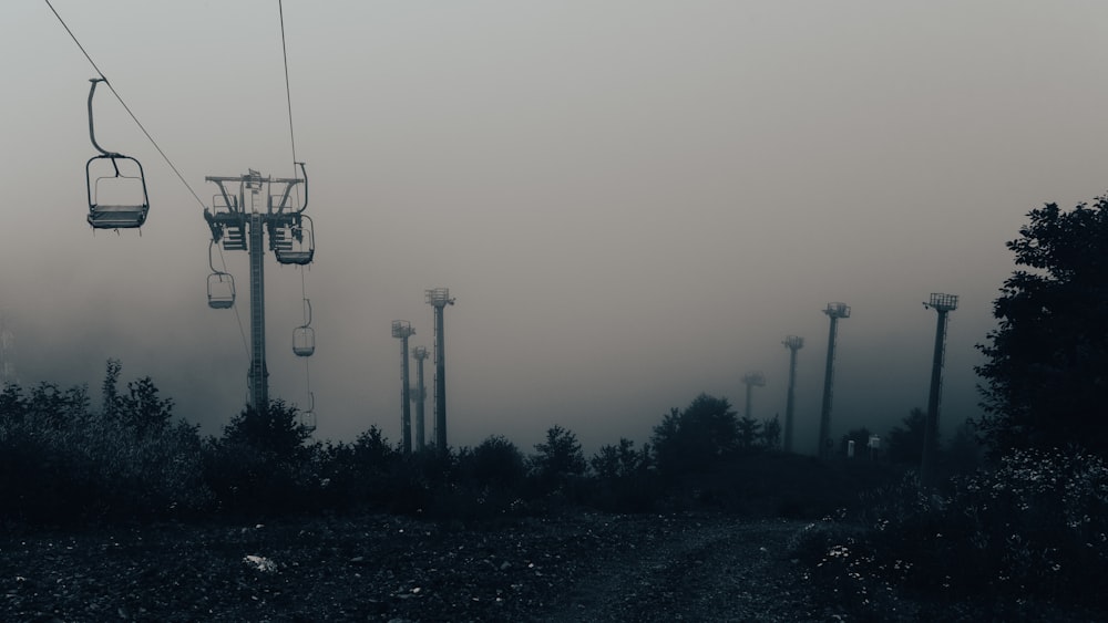 a group of chairs on a cable