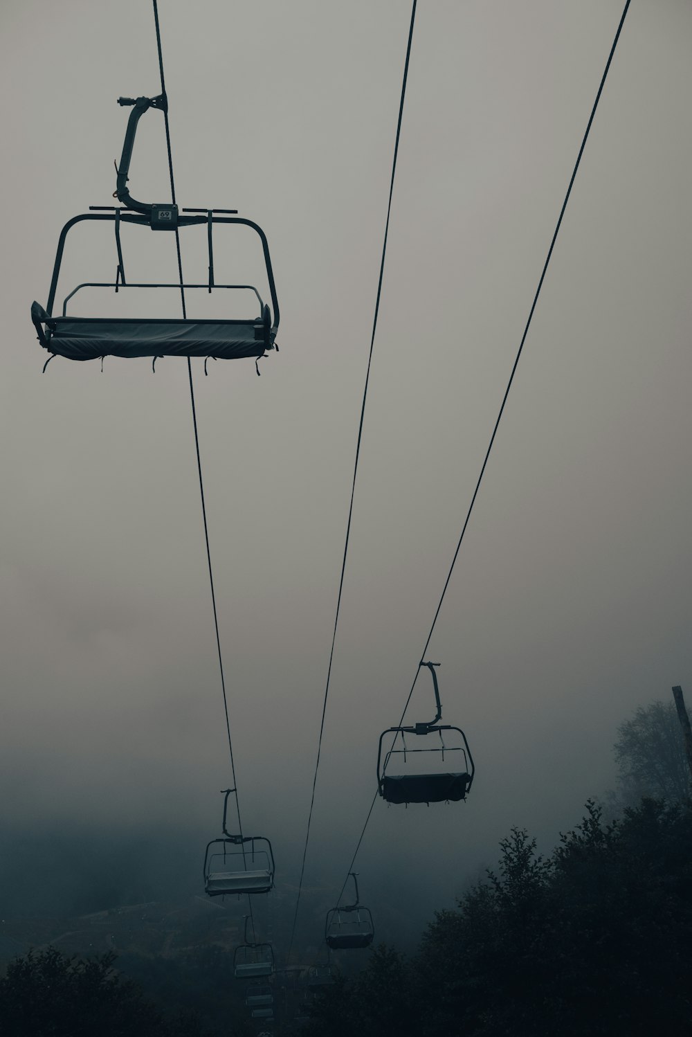 a group of people on a cable car