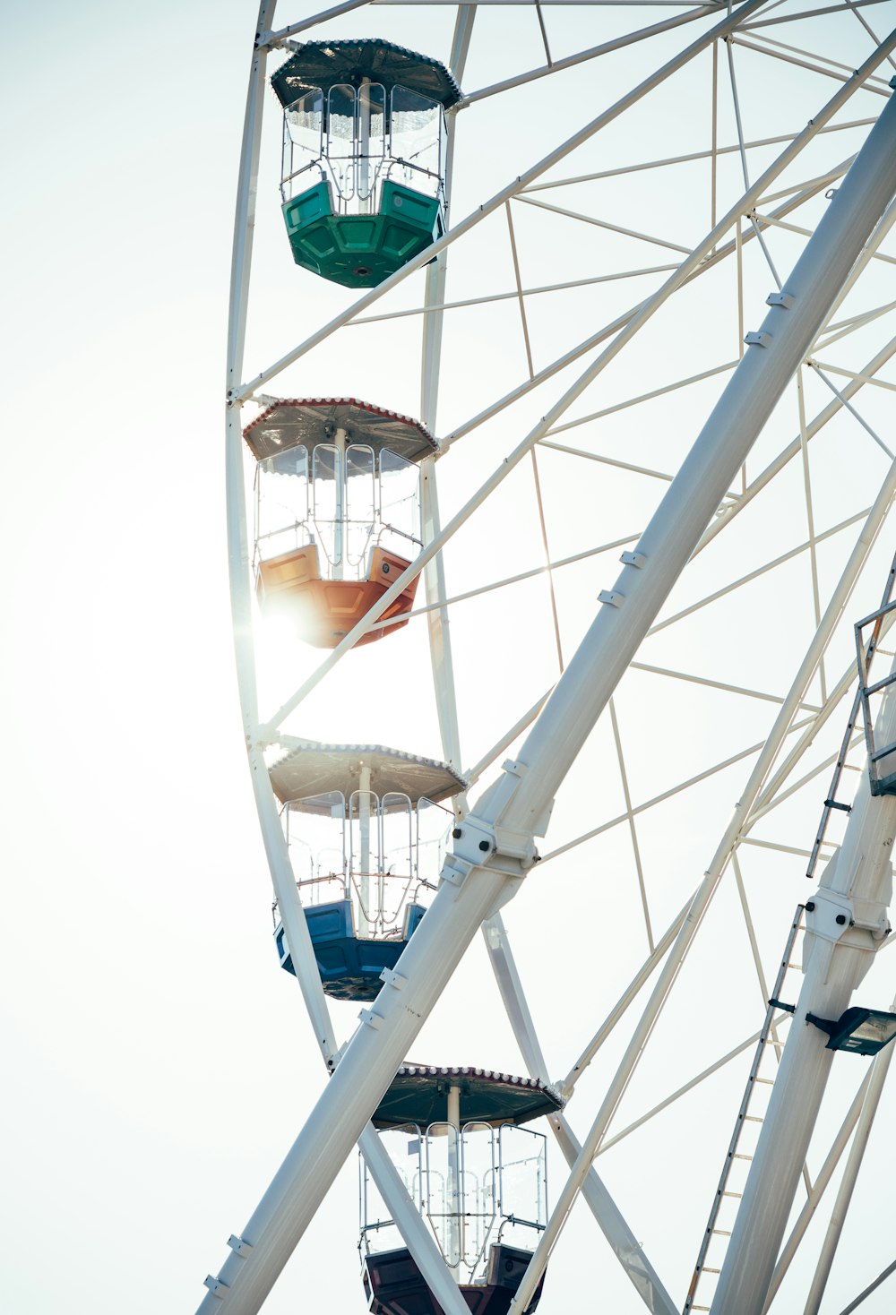 a ferris wheel with a couple of people on it