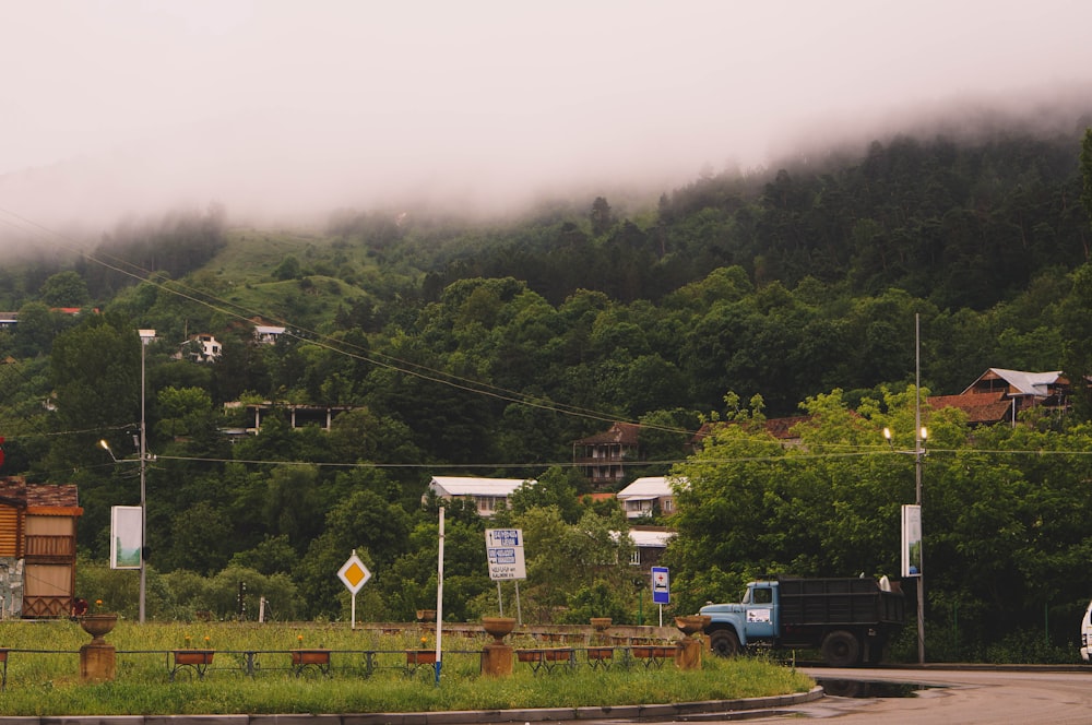 a truck driving down a road