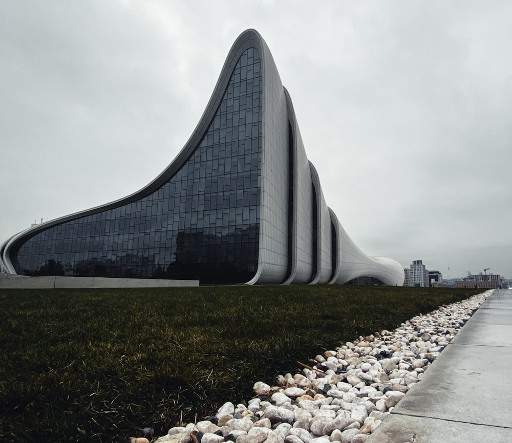 a large building with a curved roof