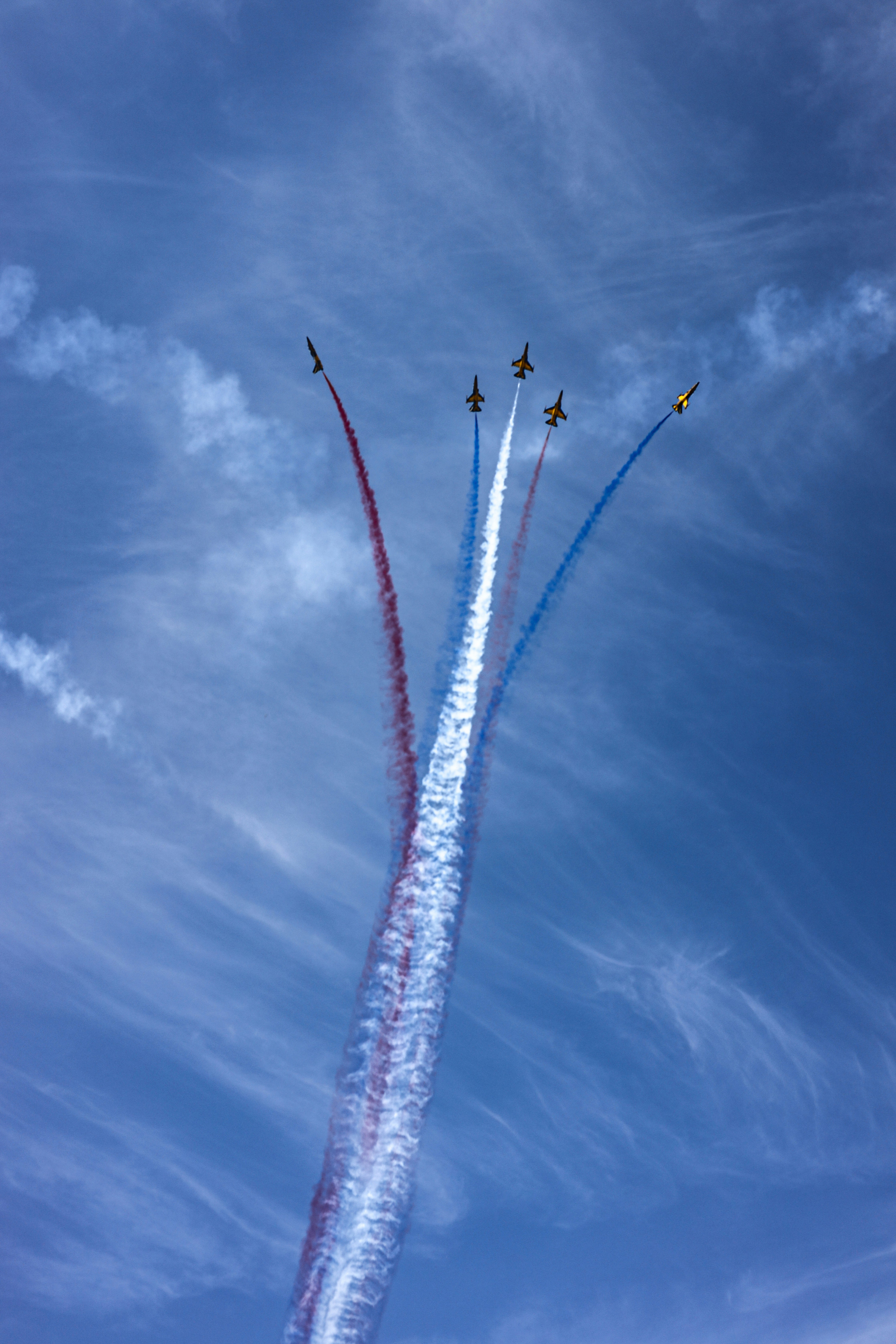 a group of airplanes flying in formation