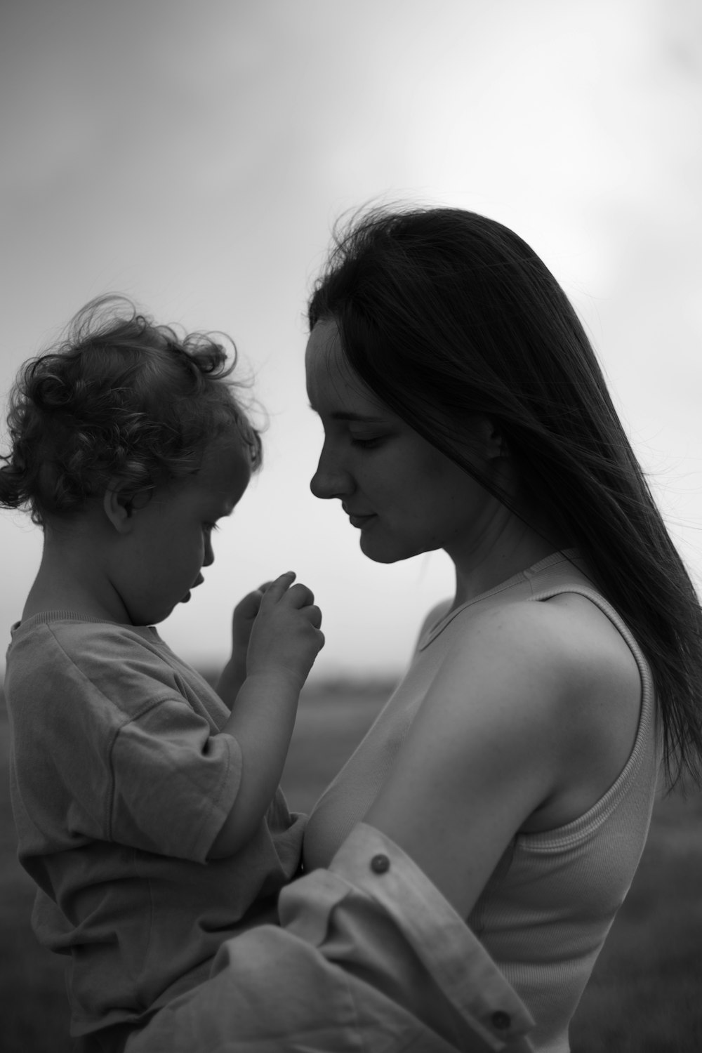 a woman holding a baby