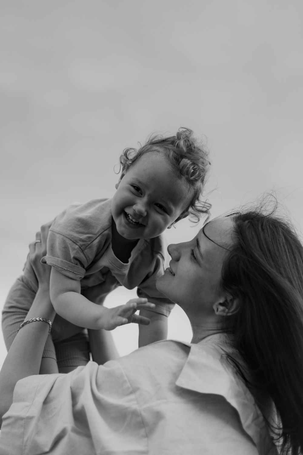 a woman holding a child