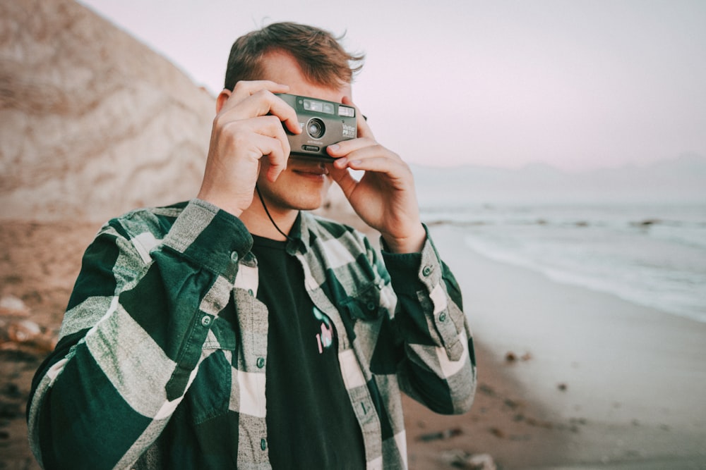 a person holding a camera