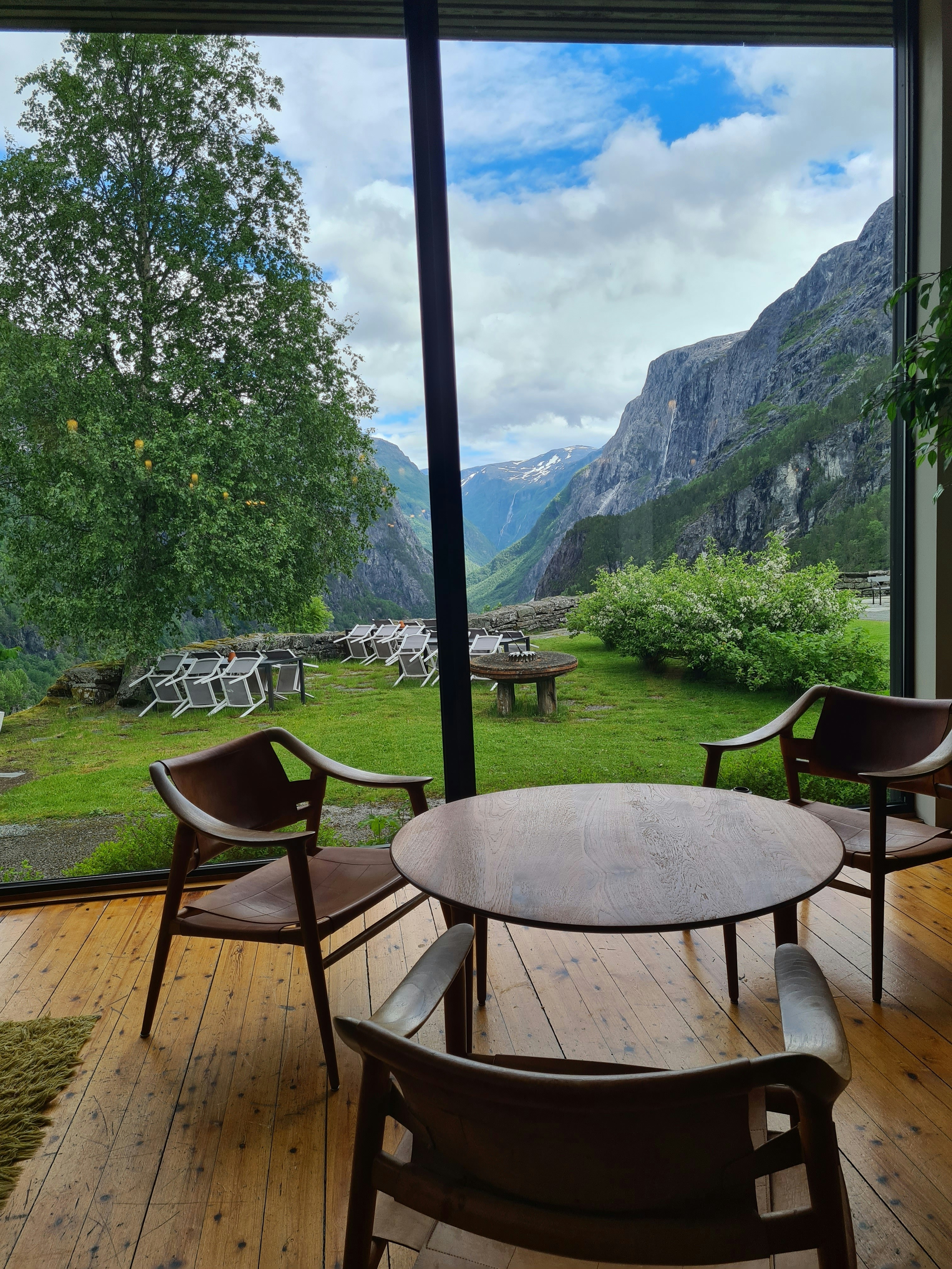 a table and chairs on a deck
