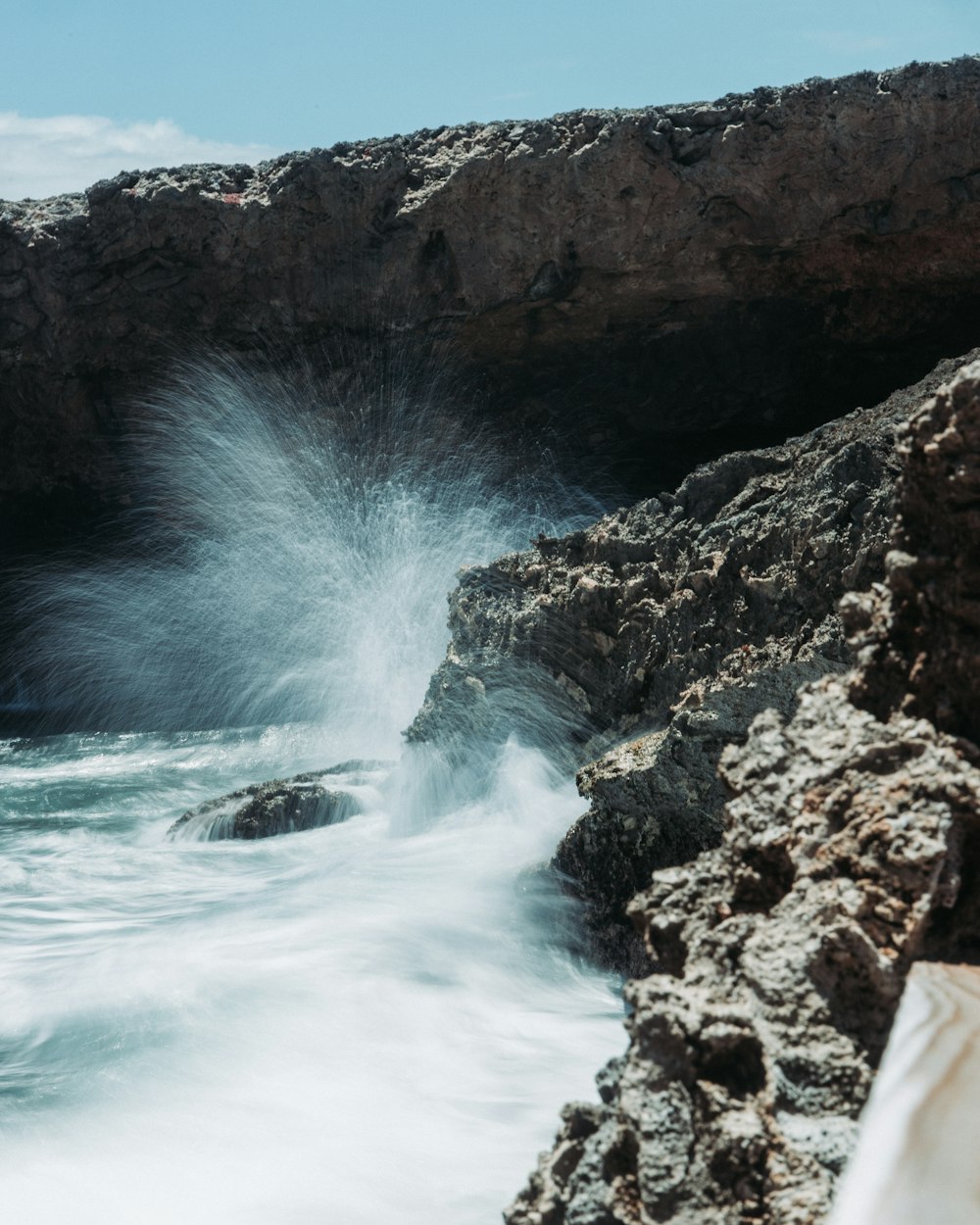 a waterfall over a cliff