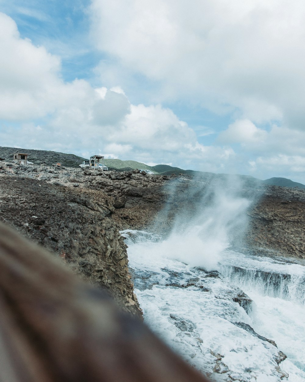 a person looking at a waterfall