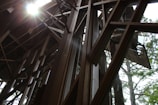 Site-responsive installation interacting with natural sunlight and architectural elements.