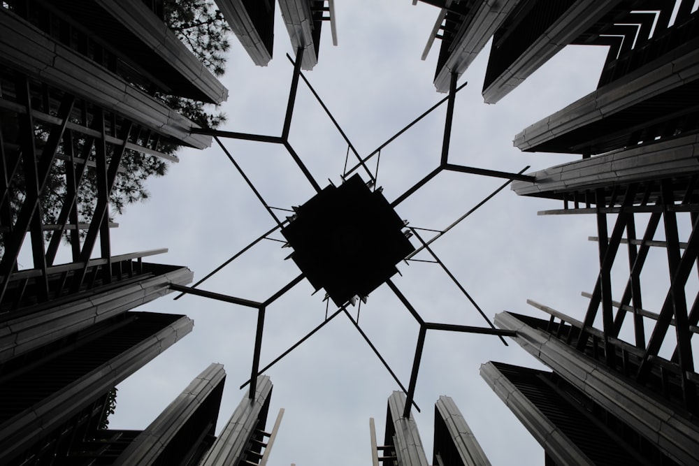 a group of buildings with a large ball from the ceiling