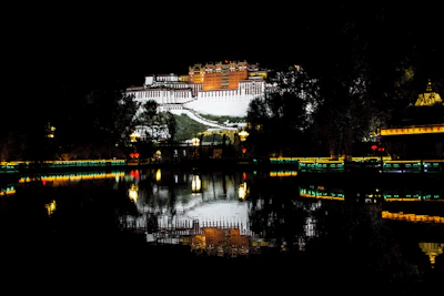 Evening shot of the IMTS main building illuminated, reflecting academic pride.