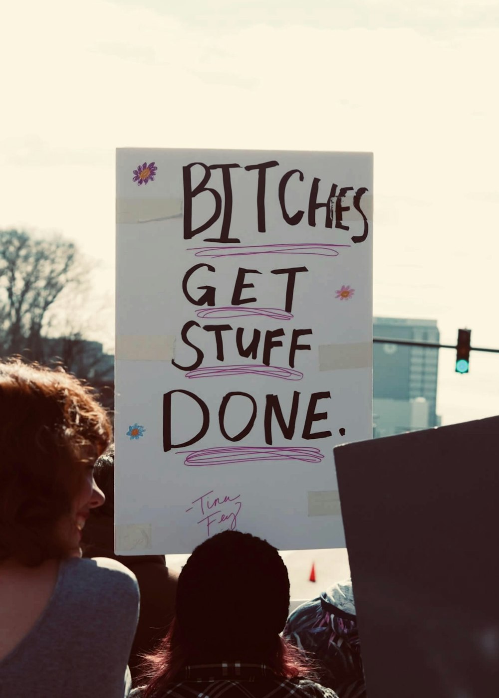 a person holding a sign