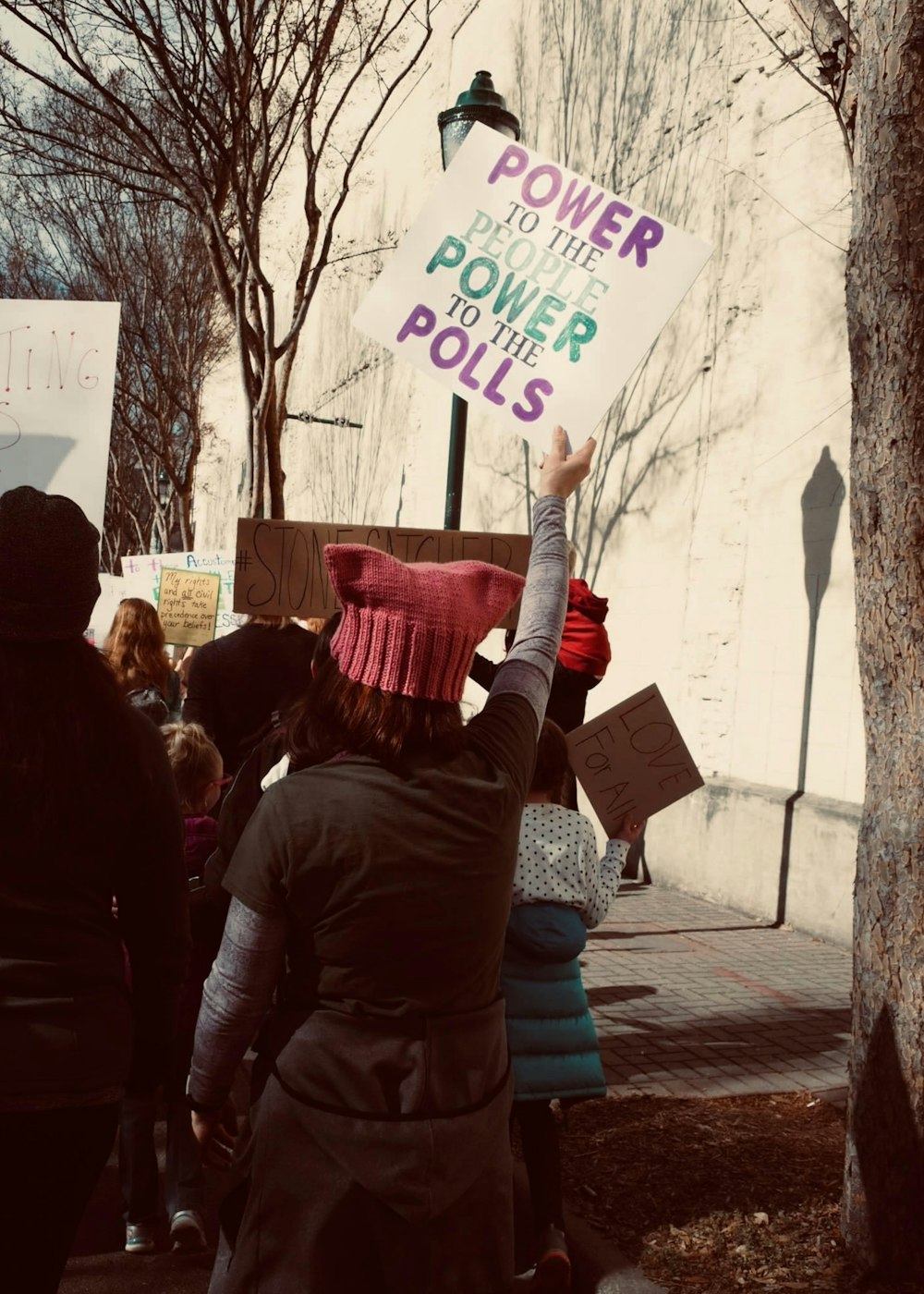 a person holding a sign