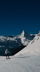 a person skiing on the snow
