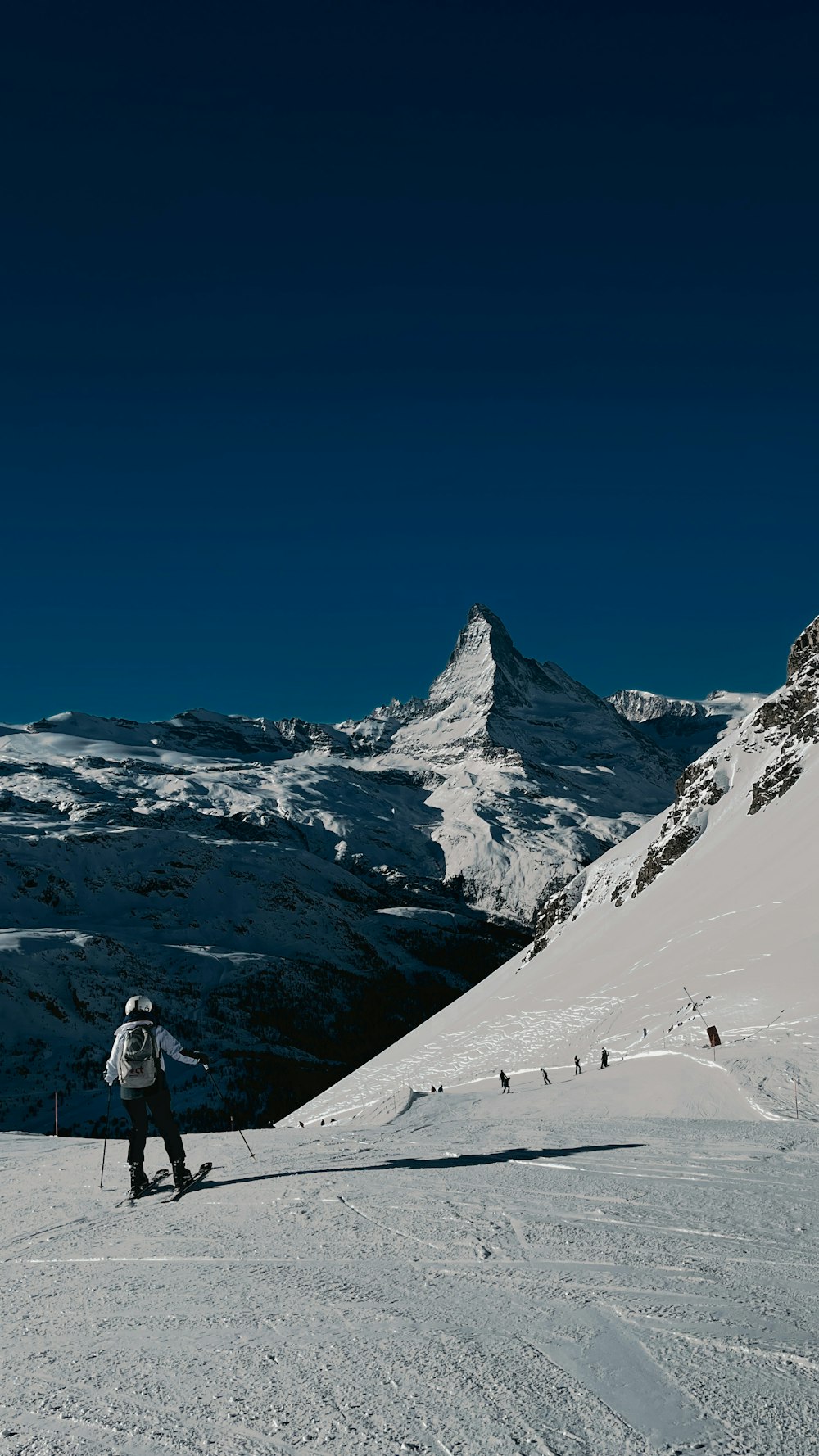 a person skiing on the snow