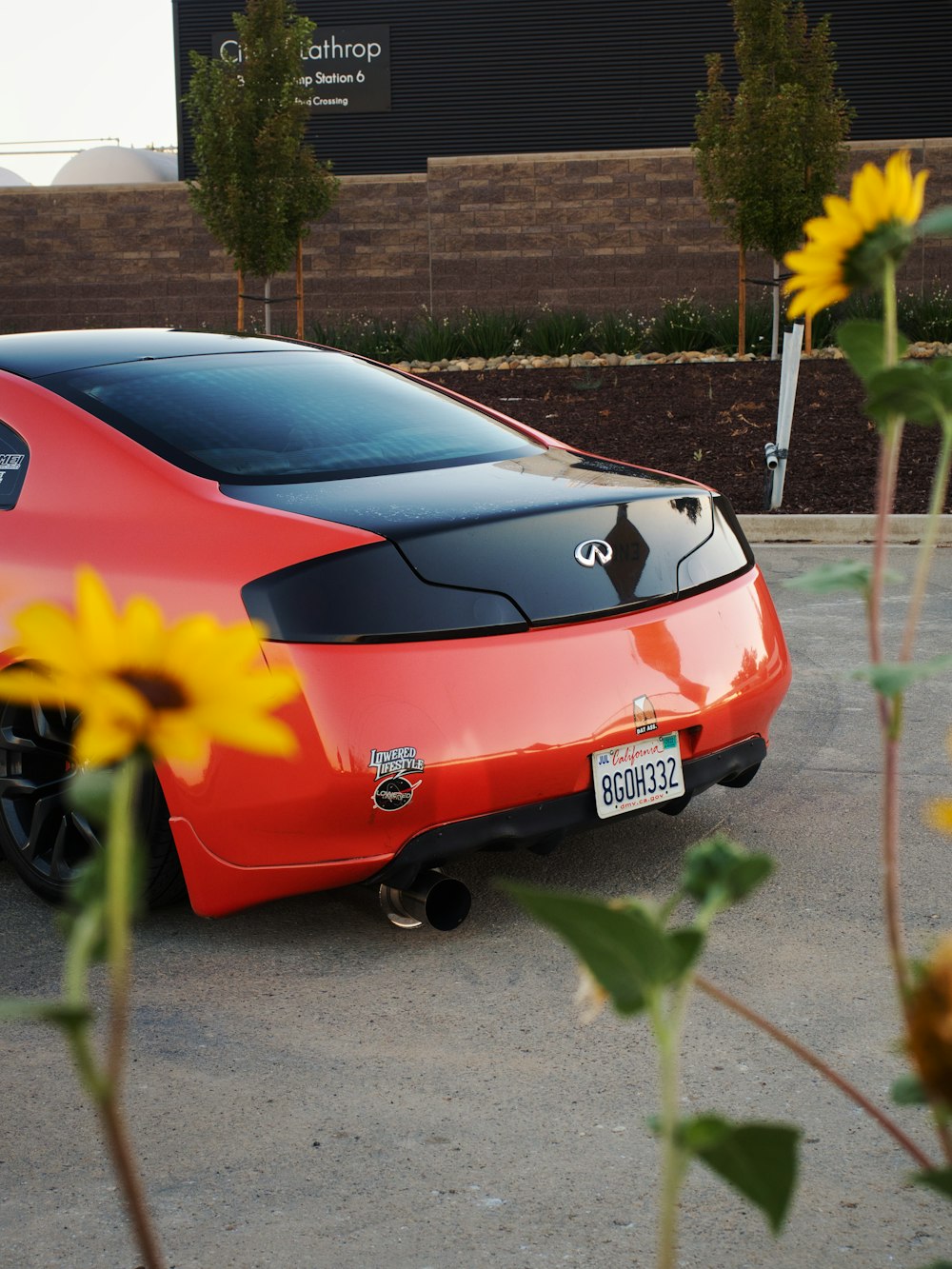 a red car parked on a street