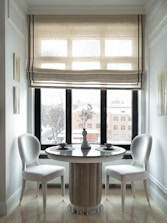 Bright kitchen nook styled with elegant, functional décor pieces.