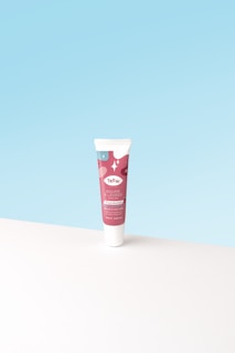 a red and white can of pop