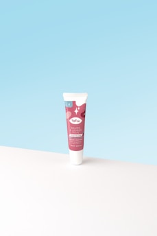 a red and white can of pop