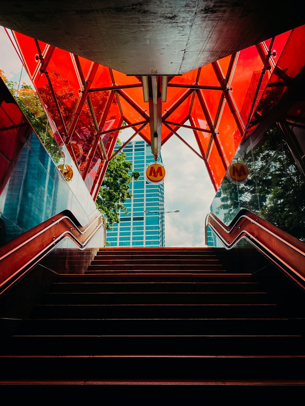 a staircase with colorful glass windows