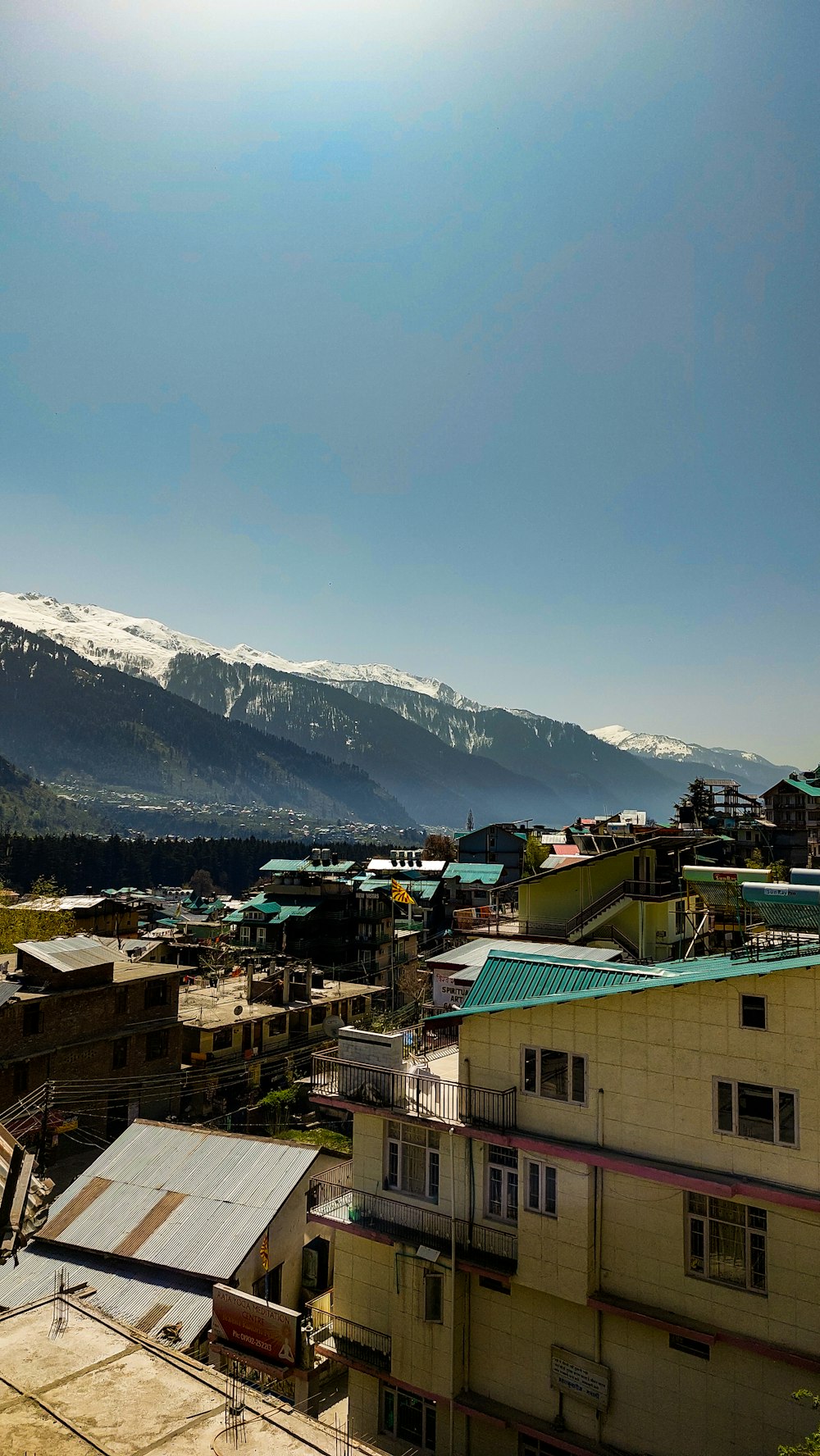 a city with a mountain in the background