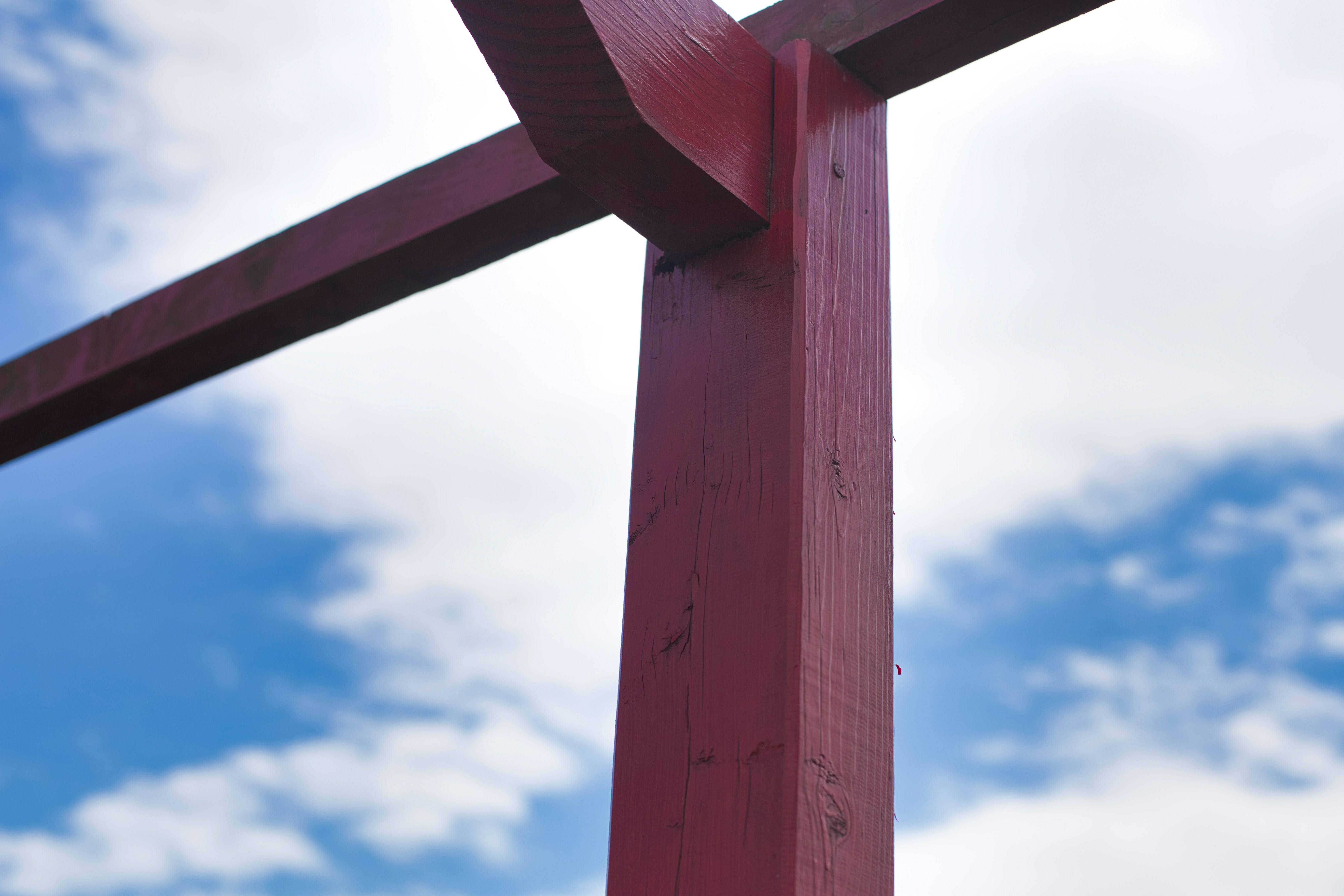 a red bridge with blue sky