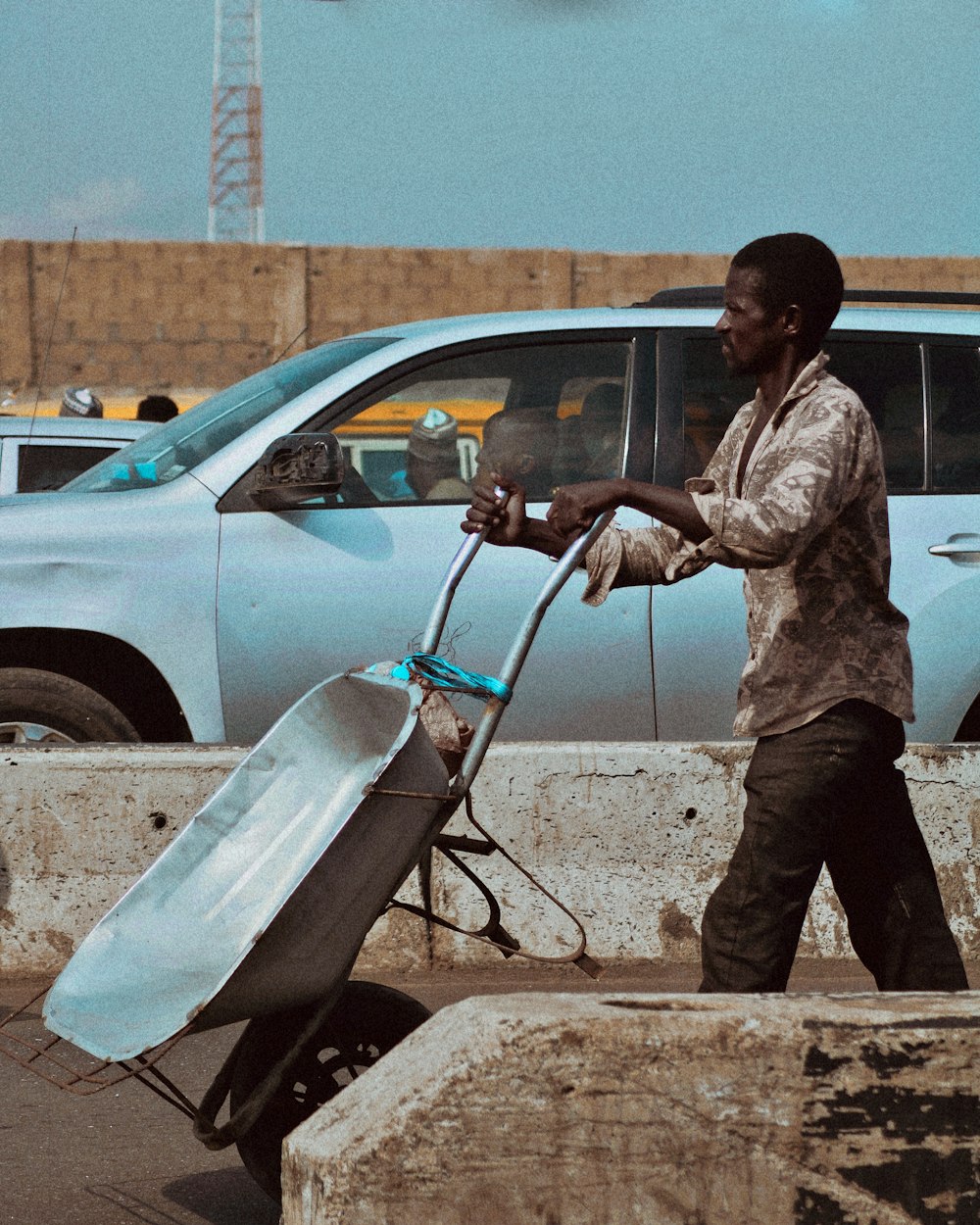 a man holding a surfboard