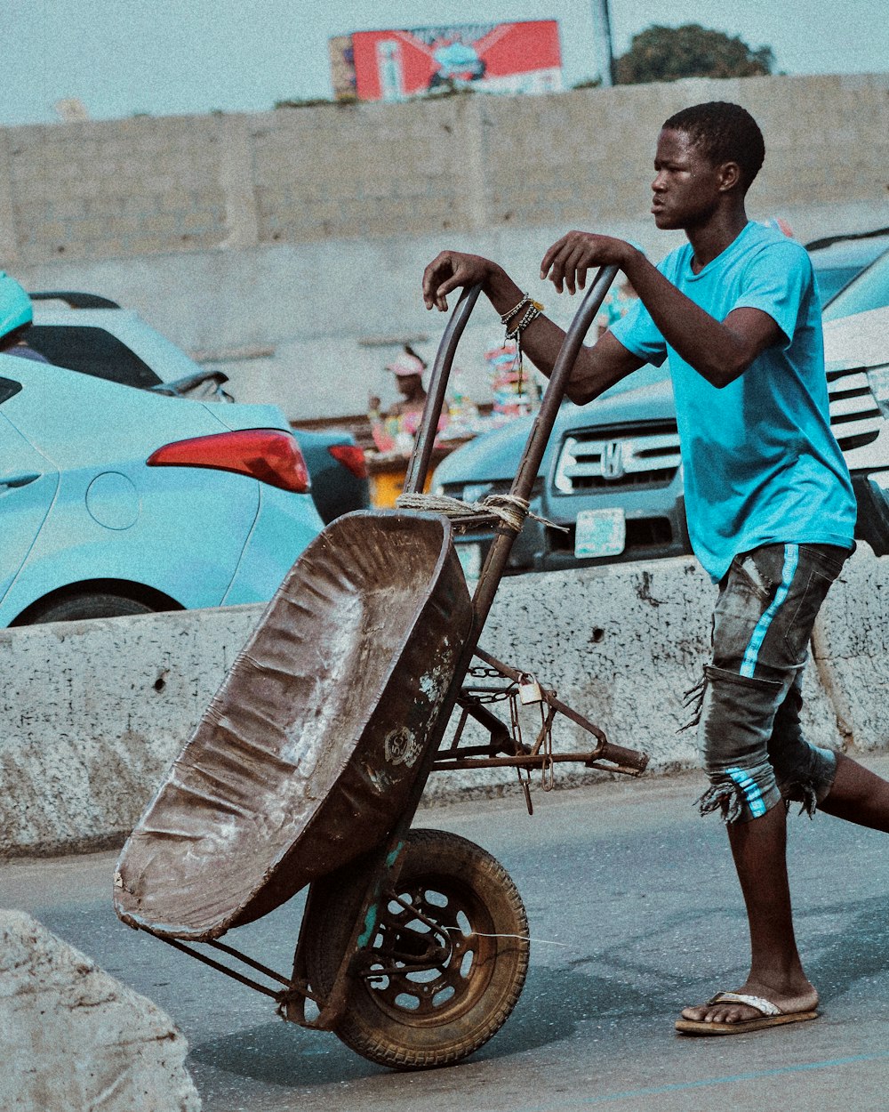a man pushing a cart