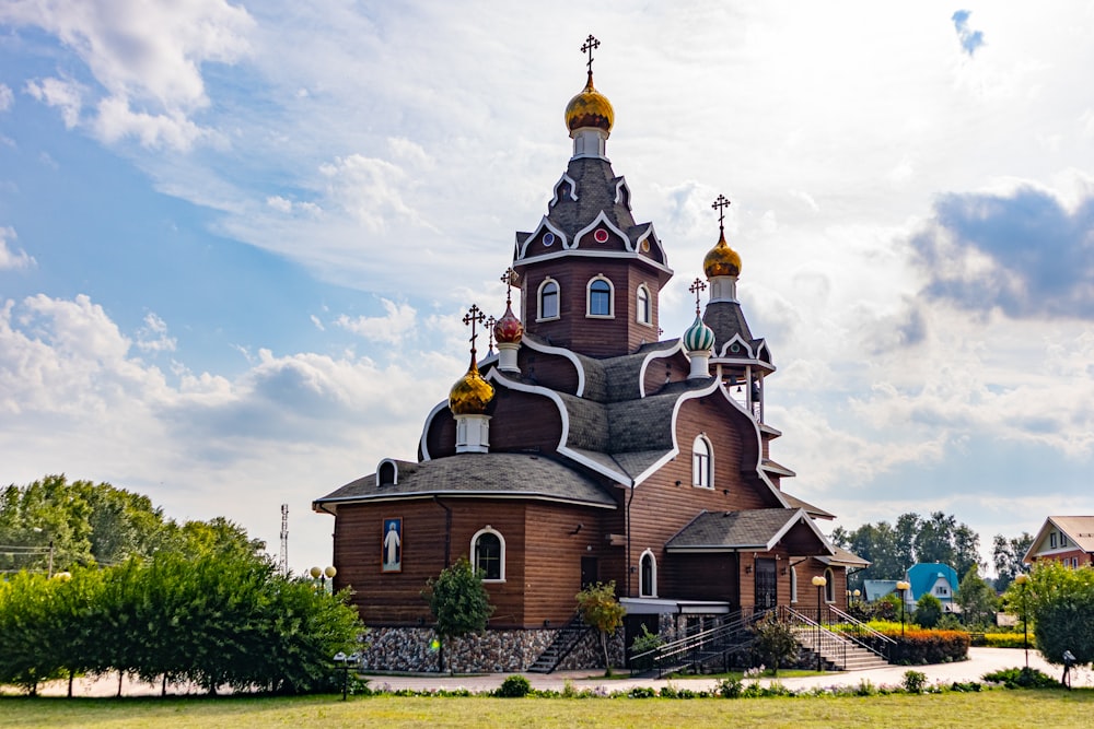 a church with a gold domed roof