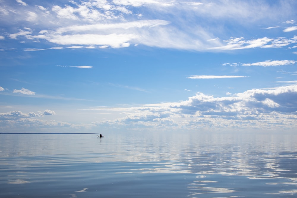 a plane flying over a body of water