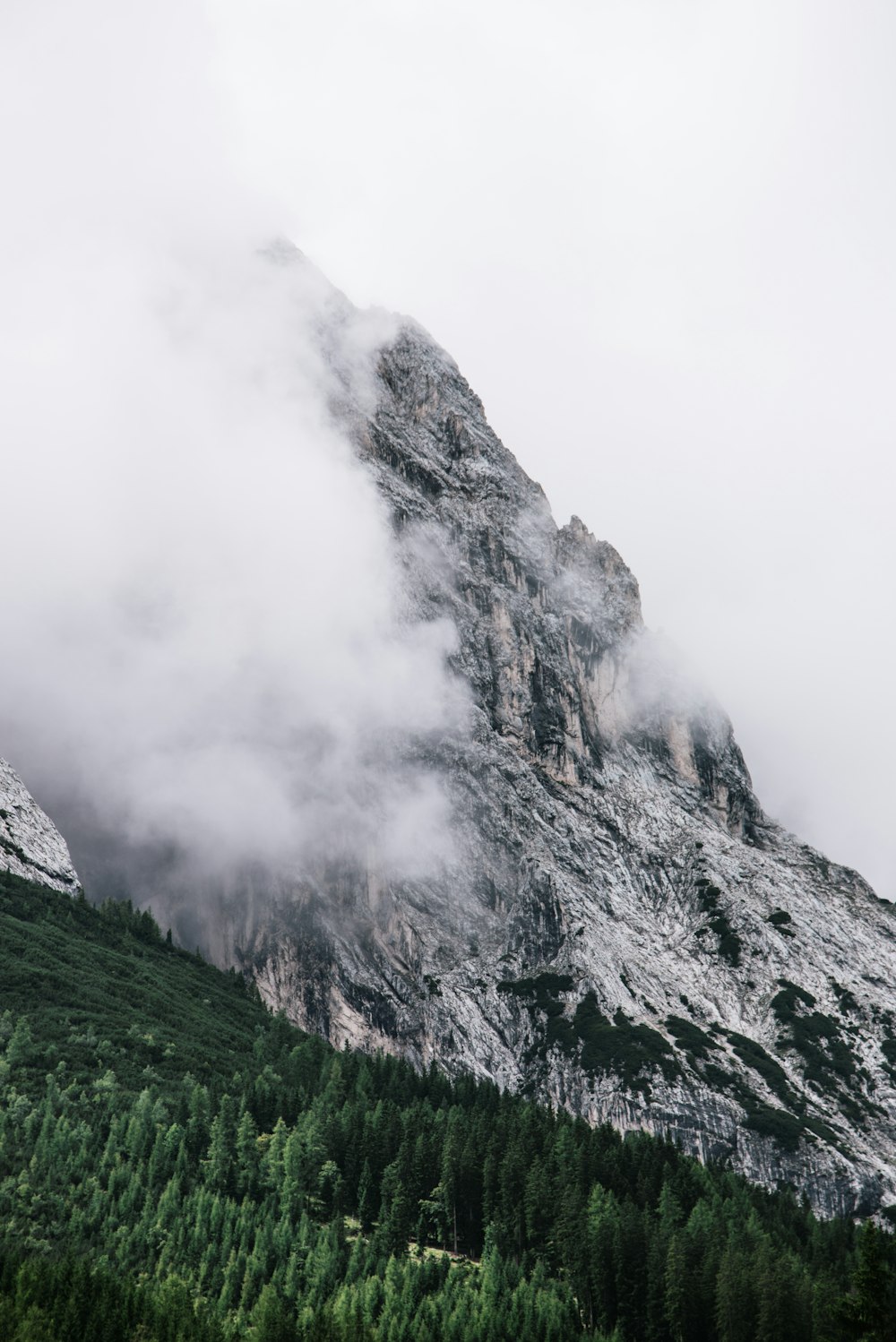 a mountain with clouds