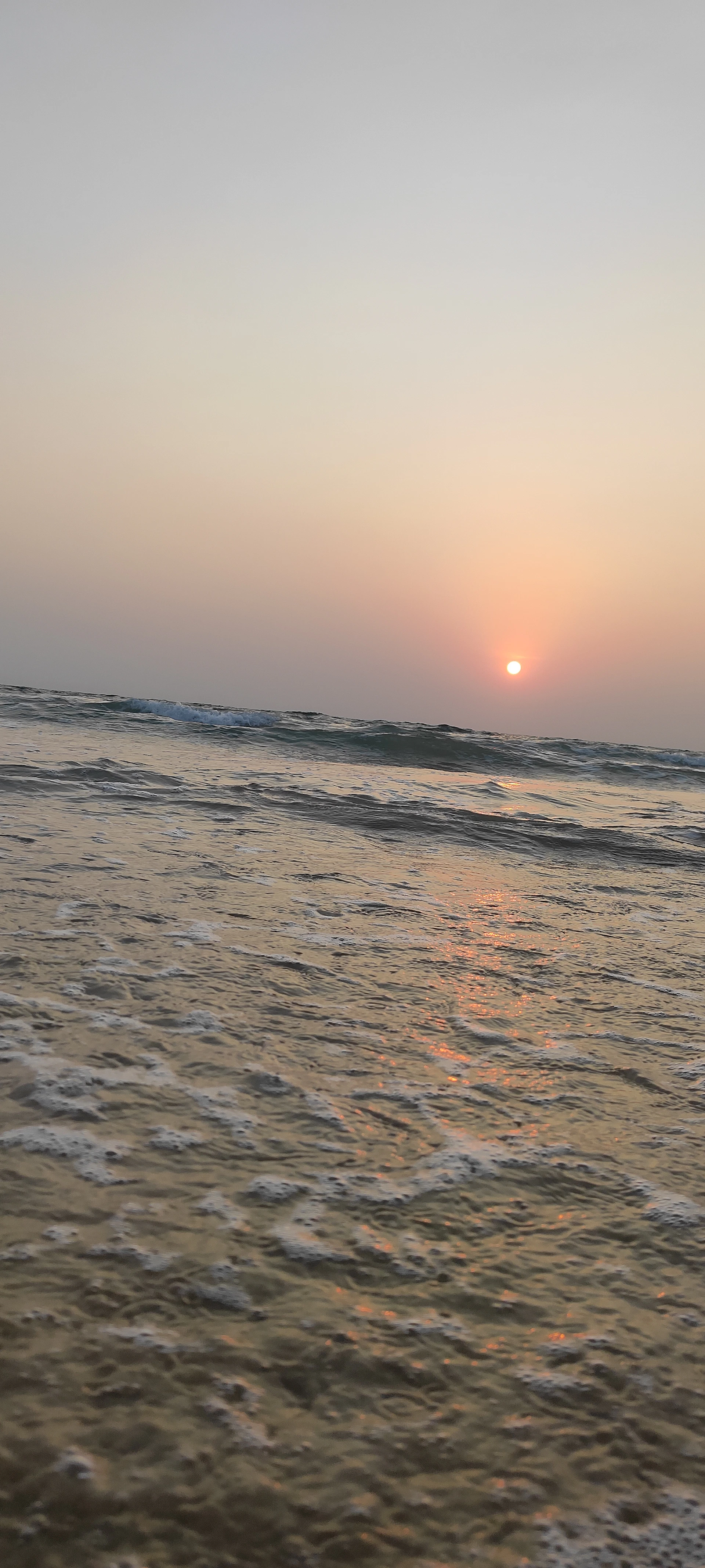 woman wearing yellow long-sleeved dress under white clouds and blue sky during daytime