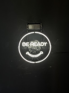 a logo with a face