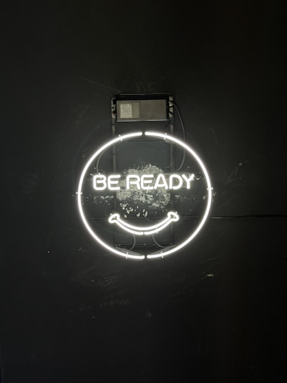 a logo with a face