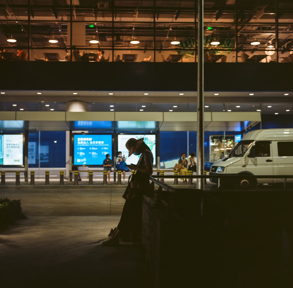 a person standing in a parking lot