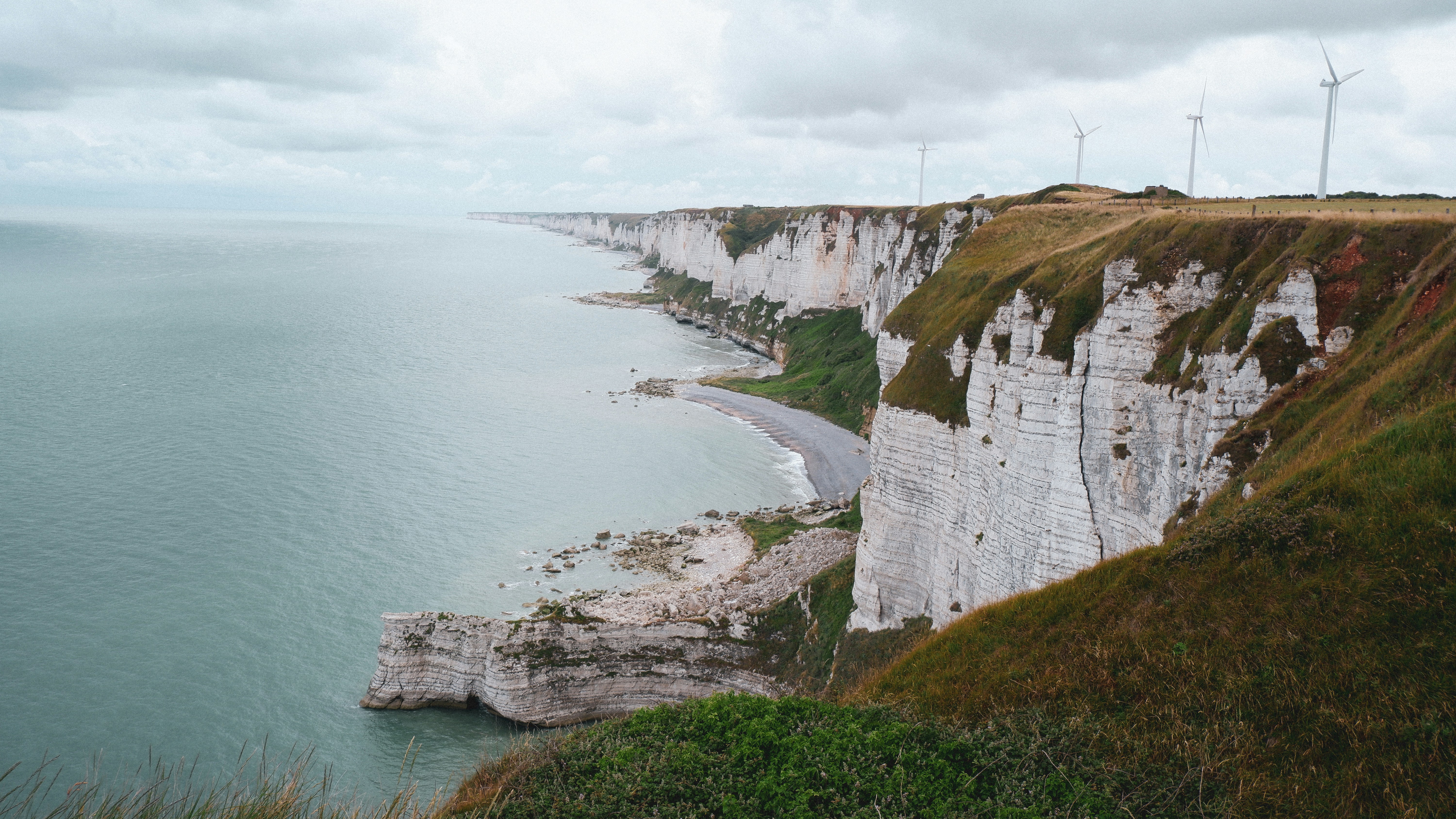 a cliff next to the ocean