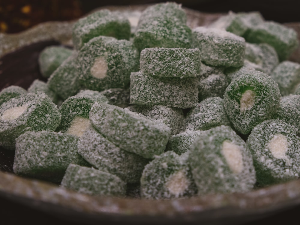 a group of green and white rocks