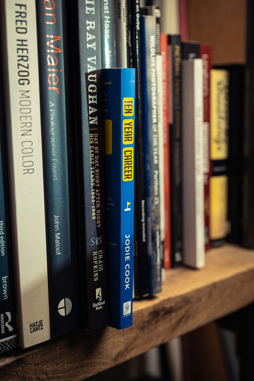 a group of books on a shelf