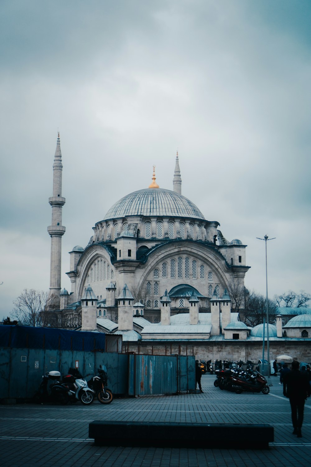 a large building with a dome and towers