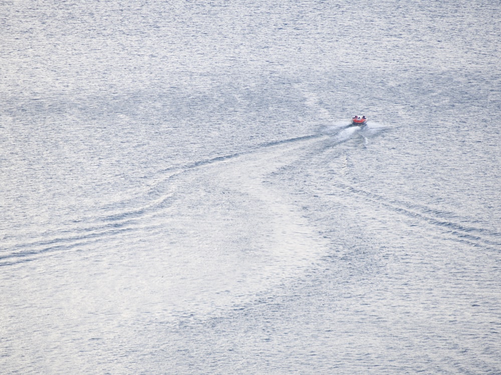 a person skiing down a snowy hill