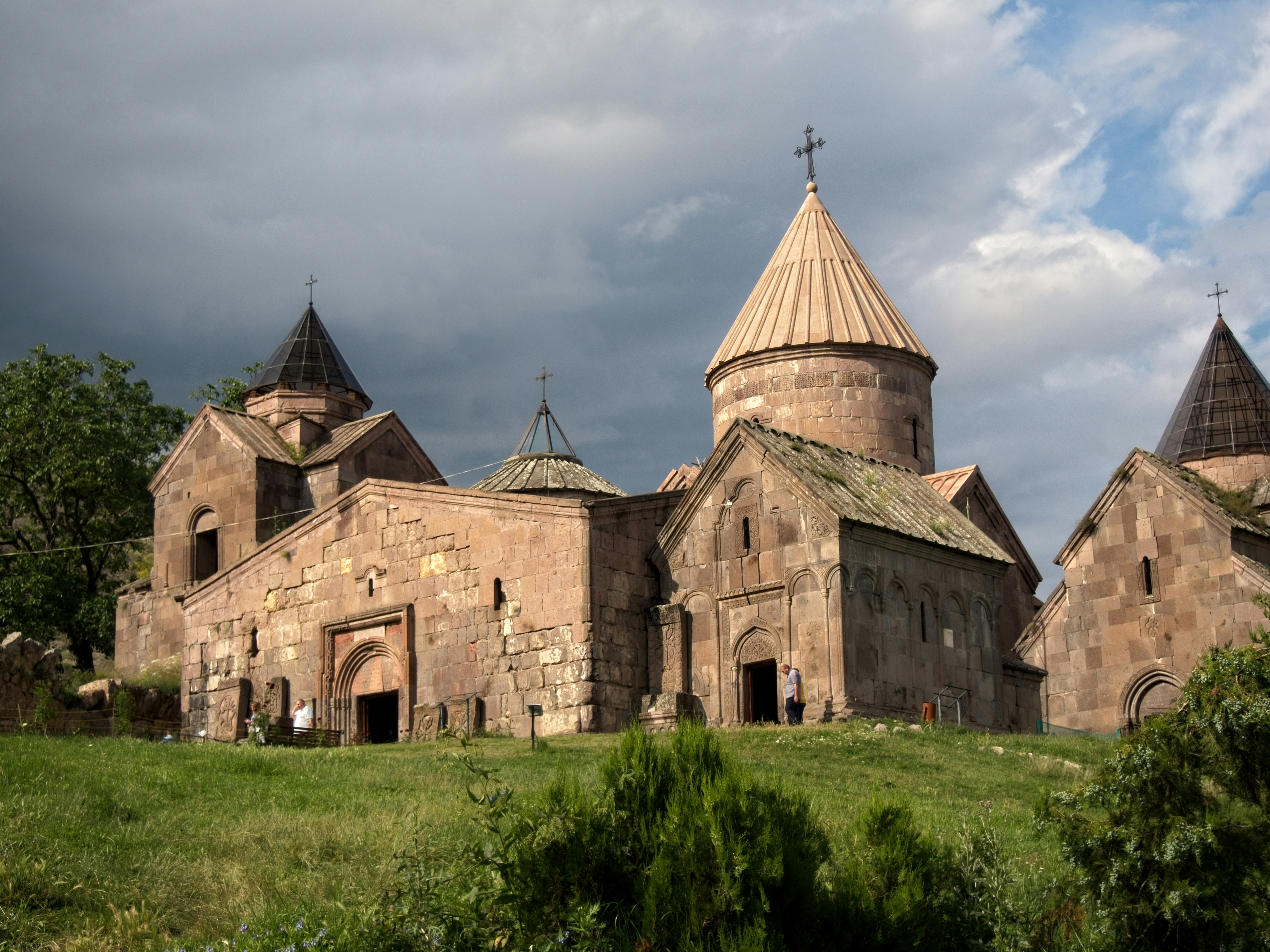 a large building with towers with Curwood Castle in the background
