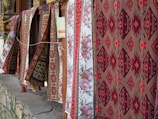 a wall with red and white fabric