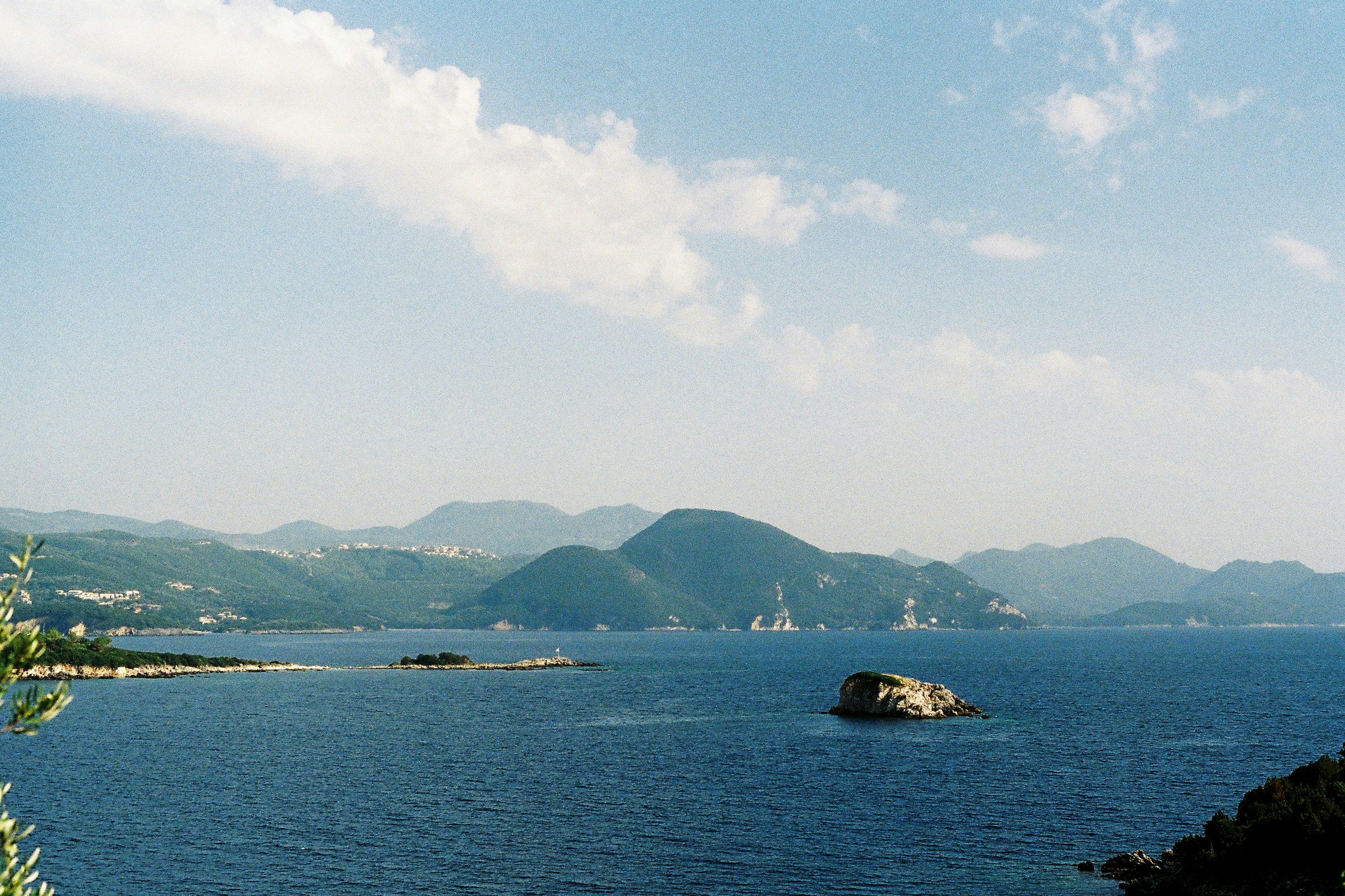 a body of water with islands in it