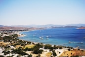 A panoramic view of yachts lined up along the coast in Albania.