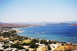 A panoramic view of yachts lined up along the coast in Albania.
