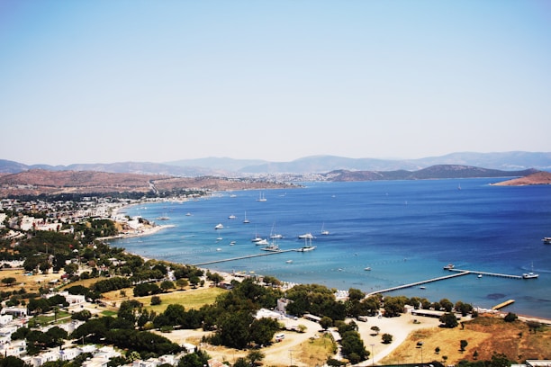 A scenic view of the Alicante coastline with boats.