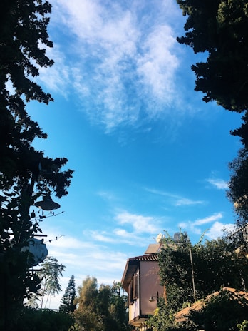 A serene image of a home with clear skies, symbolizing comfort and fresh air.