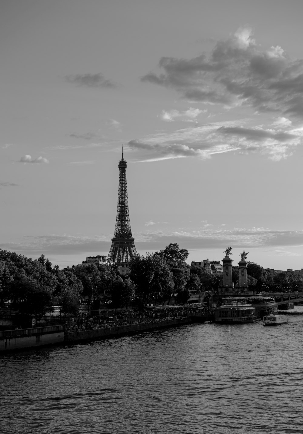 a large tower by a body of water