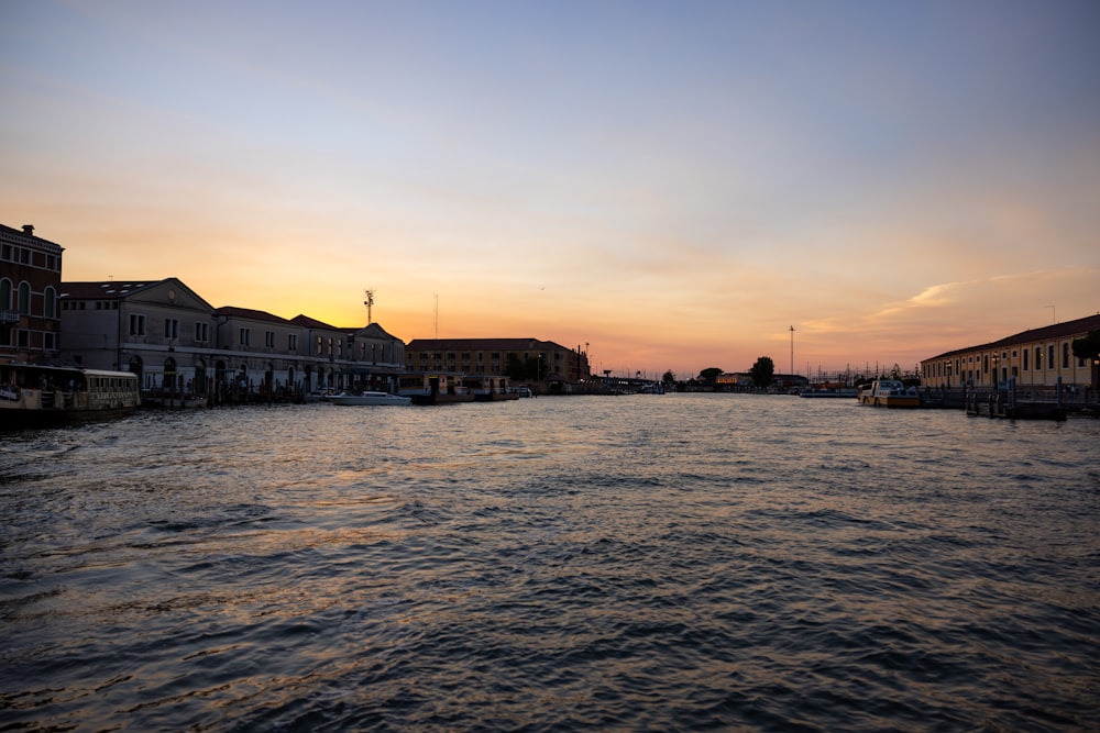 a body of water with buildings along it